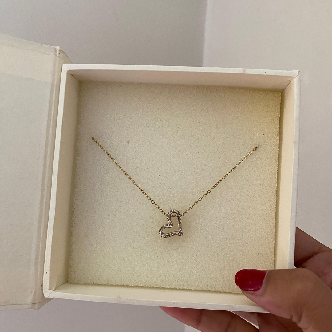 Open heart stone necklace in a DulchiBliss kraft gift box with striped label