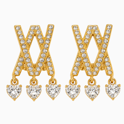 Pair of gold-tone stainless steel criss-cross earrings with three heart-shaped clear stone drops