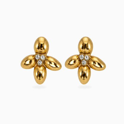 Pair of gold-tone stainless steel four-petal flower earrings with three clear stones in the center