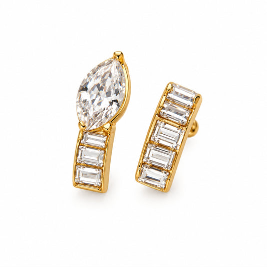 Gold-tone stainless steel rings with a marquise-cut clear stone and rectangular clear stones
