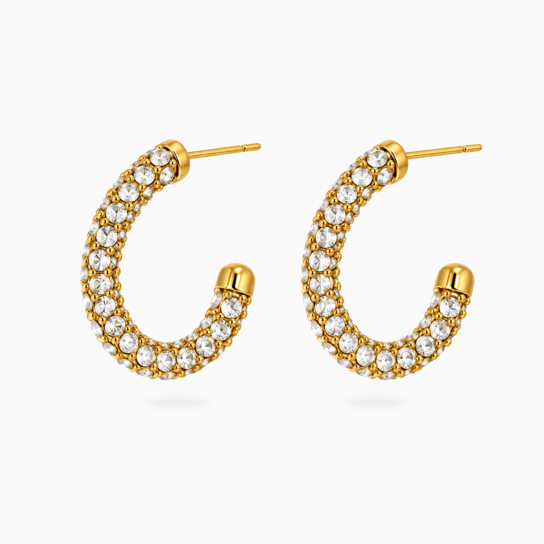 Pair of gold-tone stainless steel half-hoop earrings covered in clear stones